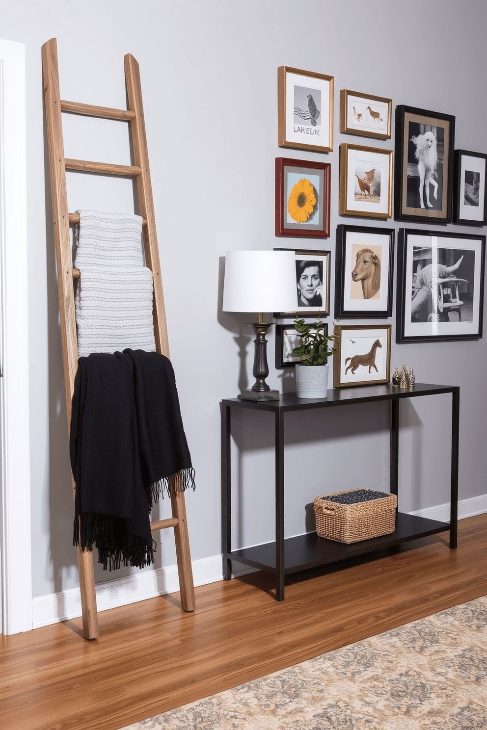 A decorative ladder stands against the wall, crafted from reclaimed wood with a rustic finish. It's adorned with cozy blankets in various textures and colors, adding warmth and style to the entryway. The entryway wall features a gallery of framed artwork, showcasing a mix of modern and vintage pieces. Complementing the art, a sleek console table sits below, topped with a stylish lamp and a small potted plant for a touch of greenery.