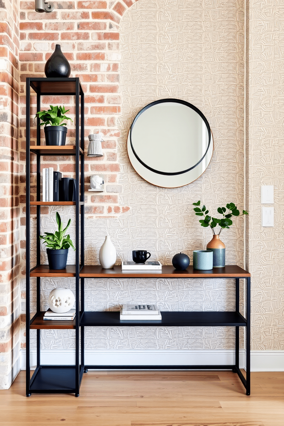 A sleek industrial-style shelving unit made of black metal and reclaimed wood stands against a brick wall. The shelves are adorned with a mix of decorative plants, books, and unique sculptures, creating an inviting focal point in the room. For the entryway wall, a combination of textured wallpaper and a minimalist console table creates a stylish first impression. Above the table, a large round mirror with a black frame reflects natural light, while a few carefully chosen accessories add personality to the space.