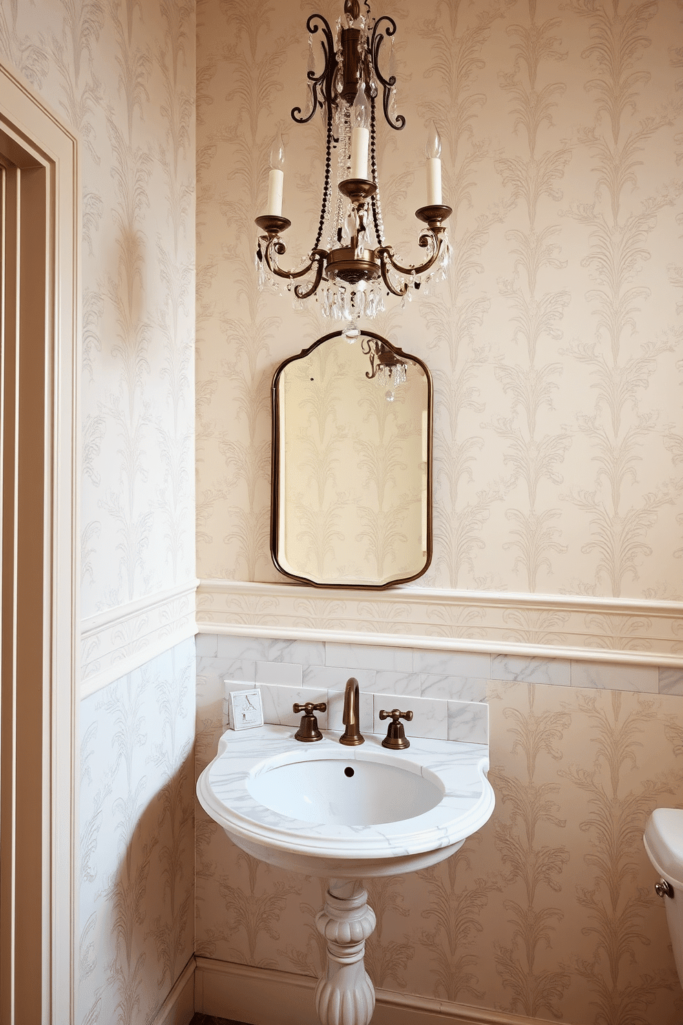 Elegant marble sink with vintage fixtures. The walls are adorned with intricate wallpaper featuring a delicate floral pattern, and a vintage chandelier hangs from the ceiling, casting a warm glow.