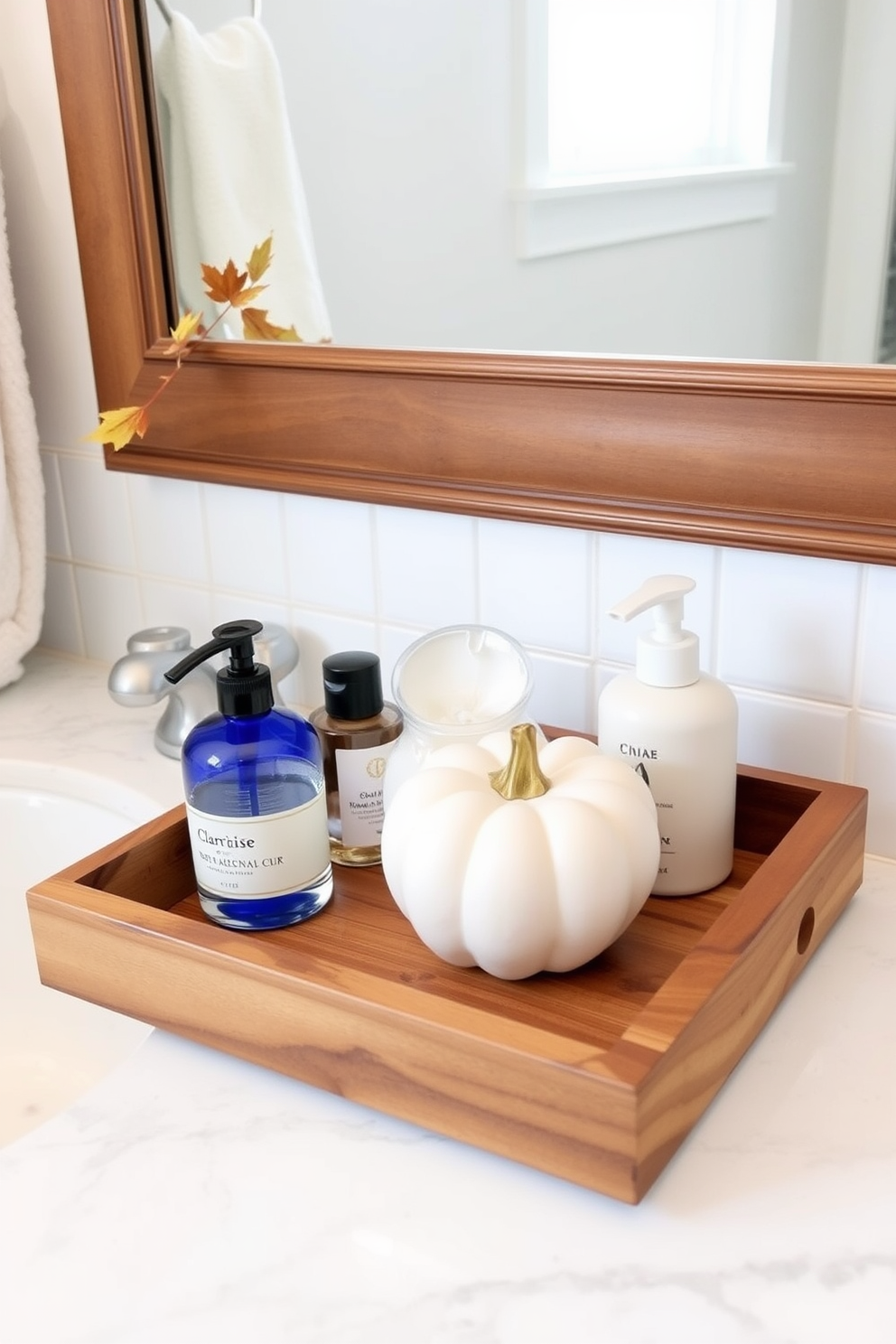 Natural wood trays elegantly display and organize essential items on a bathroom countertop. Incorporate seasonal elements like mini pumpkins and autumn leaves for a warm fall ambiance.