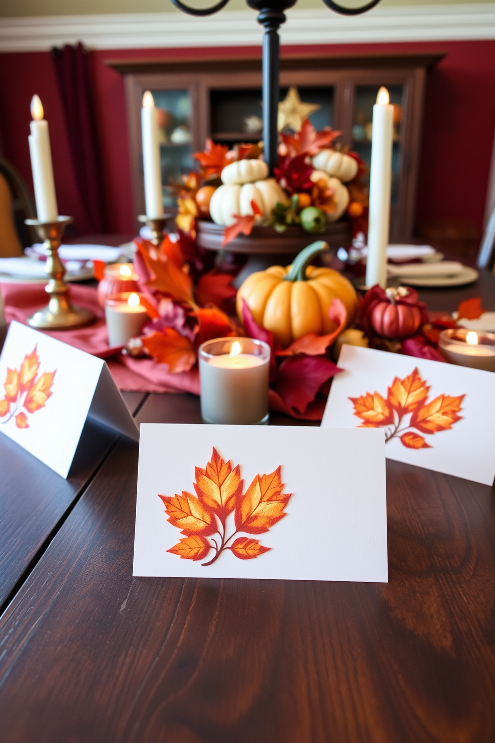 Charming place cards with fall motifs feature intricate leaf designs in warm hues of orange and gold. Each card is elegantly placed on a rustic wooden table adorned with seasonal decorations like mini pumpkins and candles. Fall dining room decorating ideas include a rich color palette of deep reds, burnt oranges, and earthy browns. A centerpiece of autumn foliage and gourds complements the cozy atmosphere created by soft lighting and textured table linens.