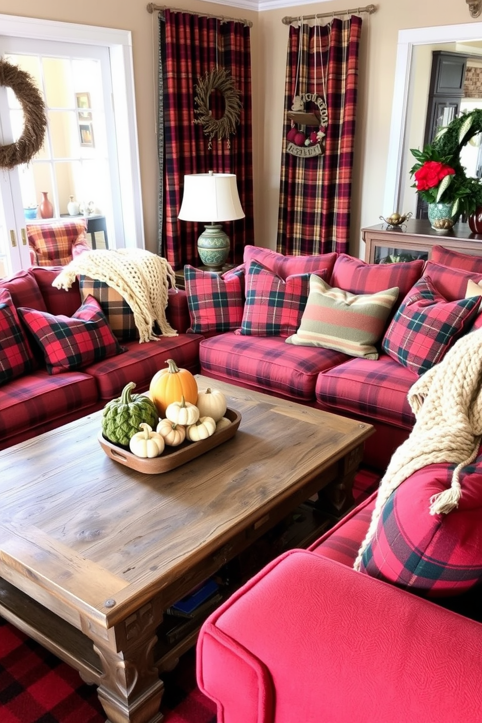 A cozy fall living room adorned with plaid patterns on cushions and throws. The warm color palette features deep reds, oranges, and browns, creating an inviting atmosphere. A large, comfortable sofa is layered with various plaid cushions, while a chunky knit throw drapes over the armrest. A rustic wooden coffee table sits in the center, topped with a few seasonal decorations like small pumpkins and candles.