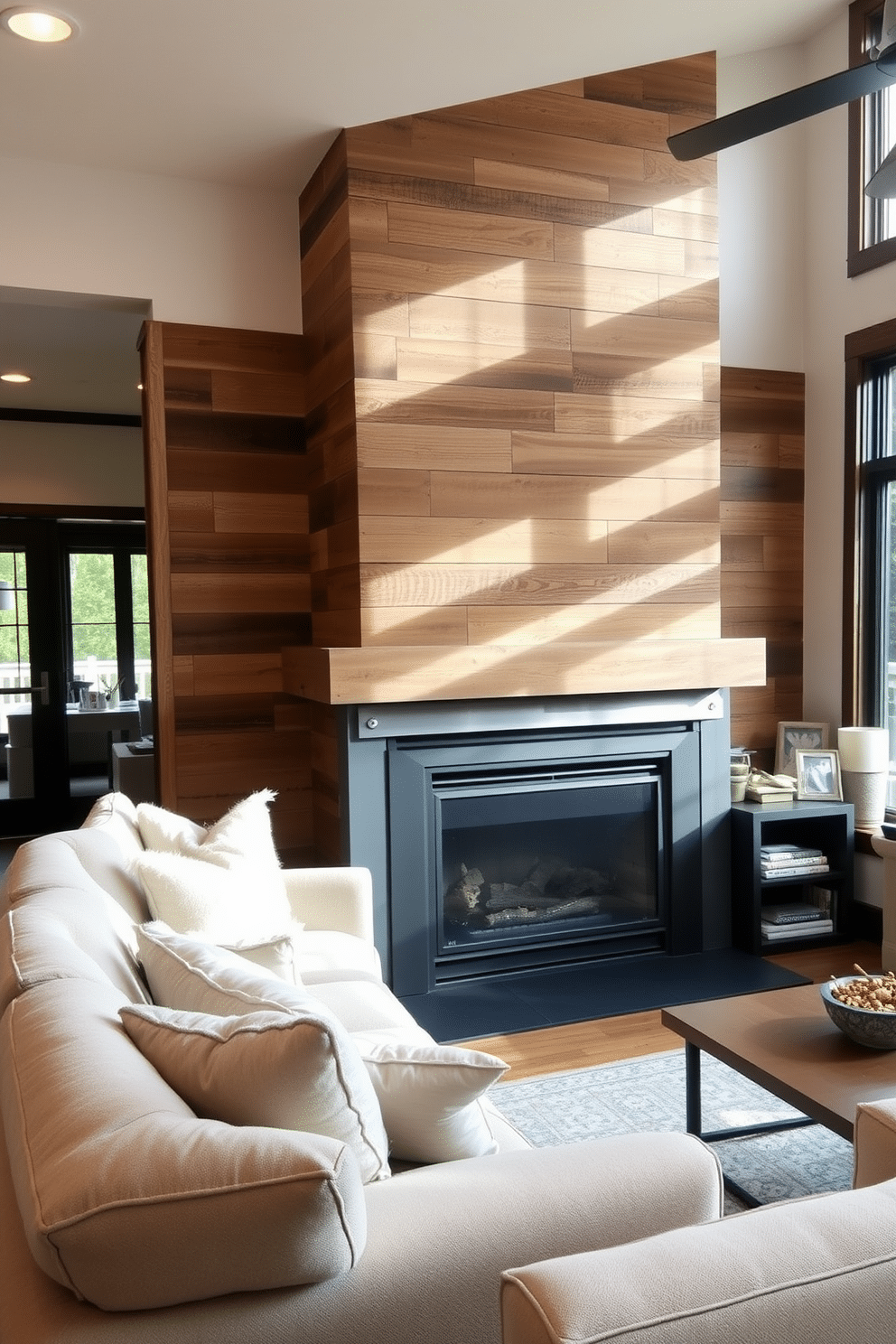 An industrial-style fireplace serves as the focal point in a cozy family room. The fireplace features exposed metal accents, surrounded by reclaimed wood paneling that adds warmth to the space. Plush seating in neutral tones is arranged around the fireplace, creating an inviting atmosphere. Large windows allow natural light to flood the room, highlighting the mix of modern and rustic decor elements.