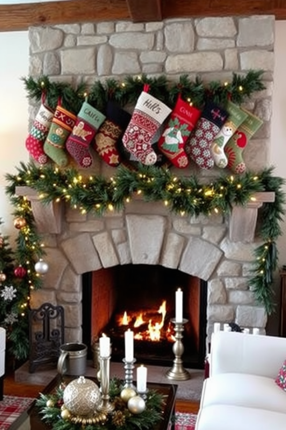 A cozy living room adorned for the holidays features a classic stone fireplace as the centerpiece. Above the mantel, colorful stockings with unique designs hang, each showcasing intricate patterns and vibrant hues, creating a cheerful and festive atmosphere. The fireplace is decorated with garlands of fresh greenery, interspersed with twinkling fairy lights. A collection of decorative ornaments and candles in varying heights is arranged on the mantel, enhancing the warm, inviting glow of the space.