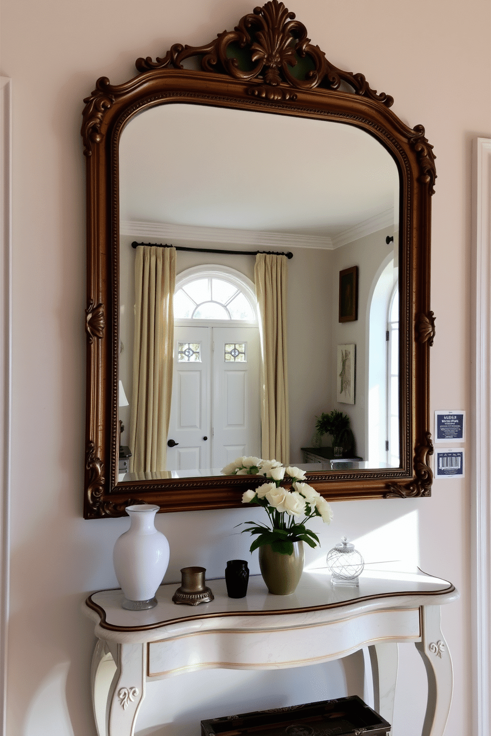 A vintage mirror with an ornate frame serves as the focal point of the foyer, reflecting natural light and adding an air of elegance. The walls are adorned with soft, neutral tones, complemented by a stylish console table below the mirror, showcasing decorative accents and fresh flowers.