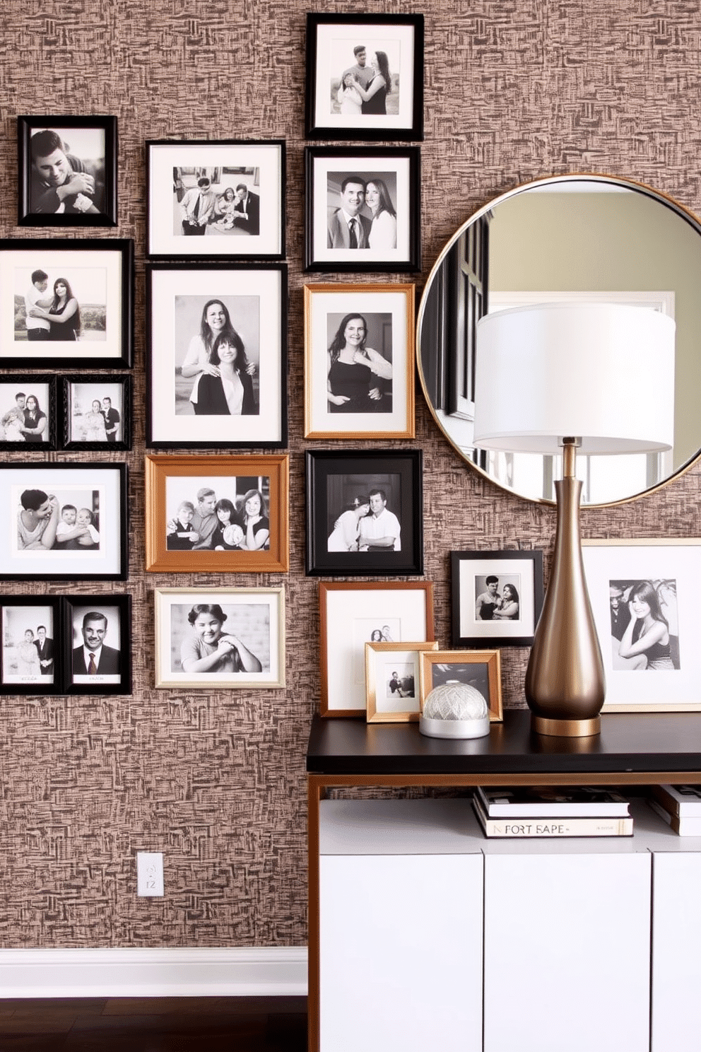 A gallery wall of family photos featuring a mix of framed black-and-white and color images. The frames vary in size and style, arranged in a visually appealing collage that tells a story of cherished memories. For the foyer wall design, envision a striking combination of textured wallpaper and a sleek console table. Above the table, a large round mirror reflects natural light, while decorative elements like a statement lamp and a few carefully selected art pieces add personality to the space.