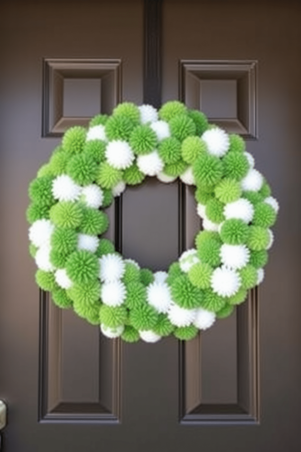 A charming front door adorned with a green and white pom-pom wreath, celebrating the spirit of St. Patrick's Day. The wreath is lush and textured, with vibrant green pom-poms interspersed with white ones, creating a festive and inviting entrance.