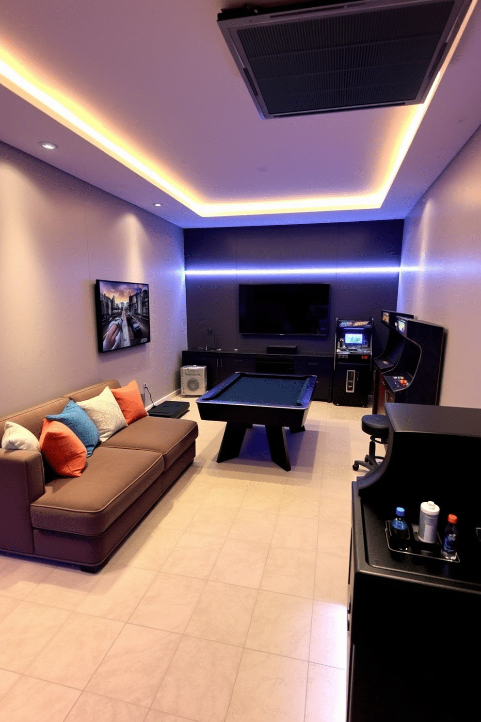 A cozy game room designed for fun and relaxation. The space features soft, ambient lighting that creates an inviting atmosphere, with strategically placed LED strips highlighting the gaming area. The room includes a large sectional sofa adorned with colorful throw pillows, facing a wall-mounted flat-screen TV. A sleek pool table occupies the center, surrounded by retro arcade machines and a mini bar stocked with snacks and drinks.