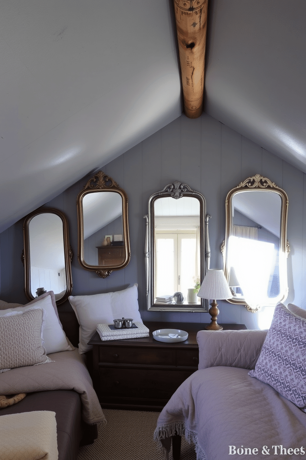 A cozy gray attic room features vintage mirrors strategically placed to enhance light reflection, creating an inviting atmosphere. The room is adorned with soft, textured fabrics and rustic wooden beams, complementing the vintage aesthetic.