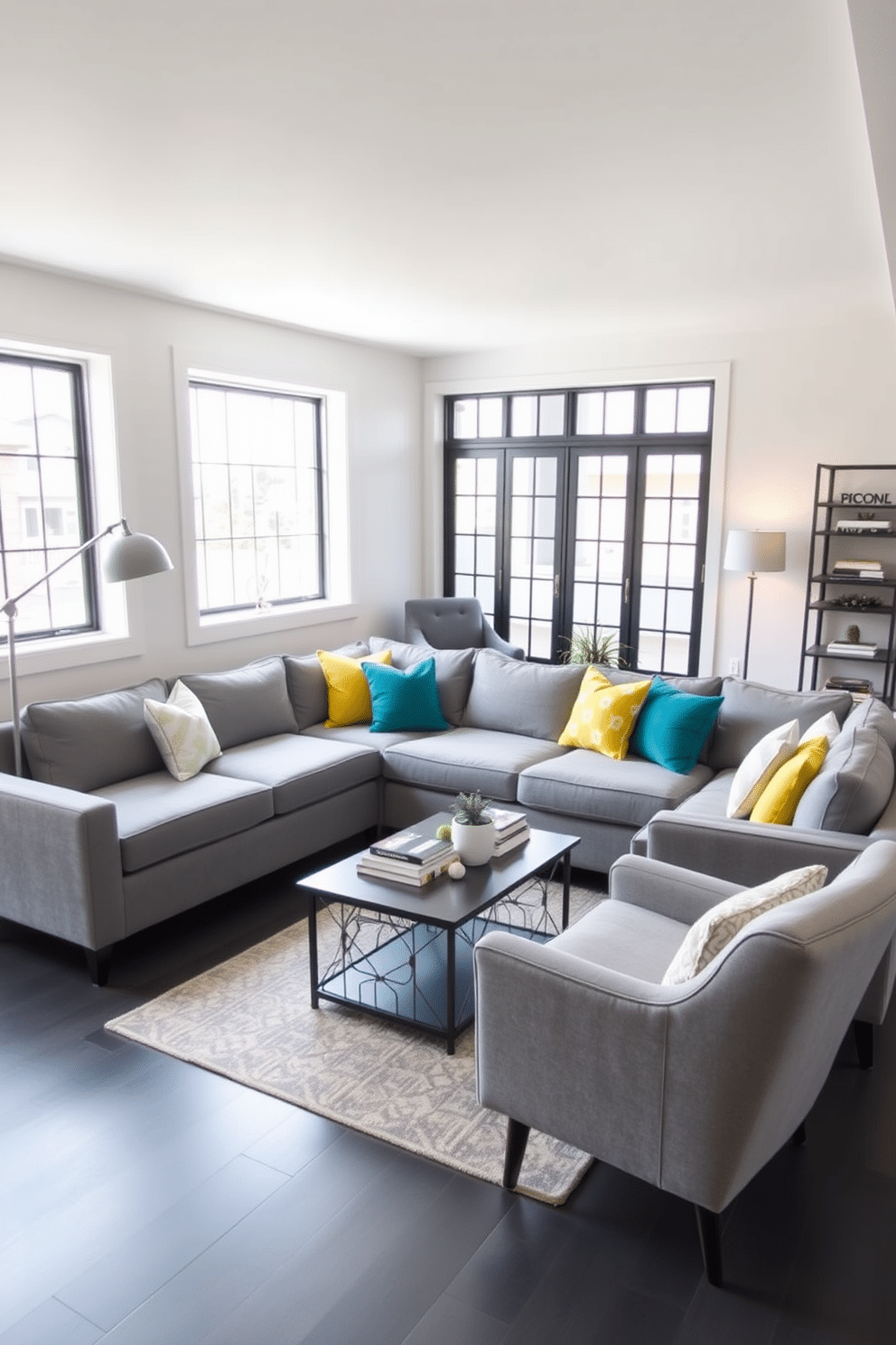 A modern gray sectional sofa is the centerpiece of a stylish basement lounge, complemented by vibrant throw pillows in shades of yellow and teal. The walls are painted a soft white, creating a bright contrast with the dark gray flooring, while a sleek coffee table sits in front, adorned with decorative books and a small potted plant. In one corner, a cozy reading nook features a plush armchair in a bold color, paired with a contemporary floor lamp that provides warm lighting. Large windows allow natural light to flood the space, enhancing the airy feel of this chic gray basement design.