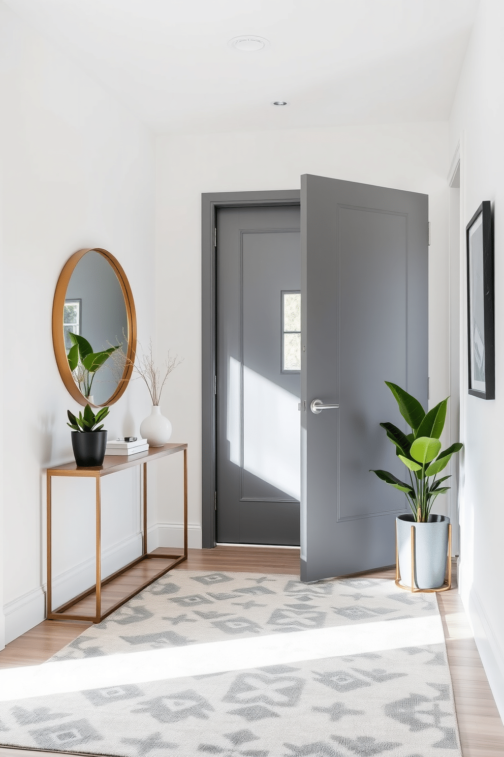 A bold gray door with sleek, contrasting hardware opens into a spacious foyer that exudes modern elegance. The walls are adorned with a soft white finish, while a geometric-patterned area rug in shades of gray and cream anchors the space. To the left, a stylish console table with a minimalist design holds a large round mirror framed in brushed gold. Flanking the console are two potted plants that add a touch of greenery, enhancing the airy feel of the foyer.