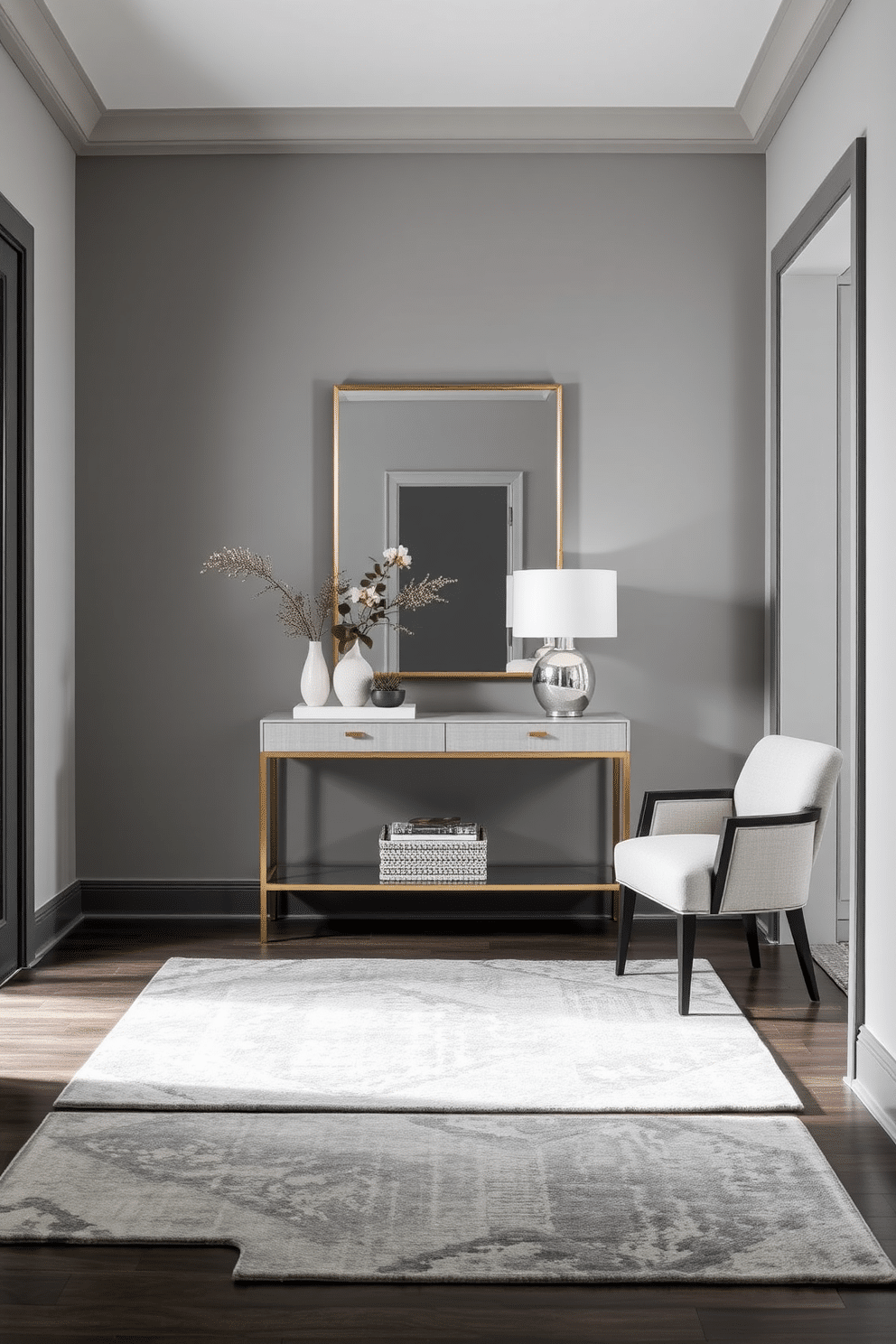 A stylish foyer adorned with layered gray rugs that add depth and texture to the space. The walls are painted in a soft gray hue, complementing the elegant design of the entrance. Incorporate a sleek console table against one wall, topped with decorative items such as a modern lamp and a small potted plant. A large mirror hangs above the table, reflecting light and creating a sense of openness in the foyer.