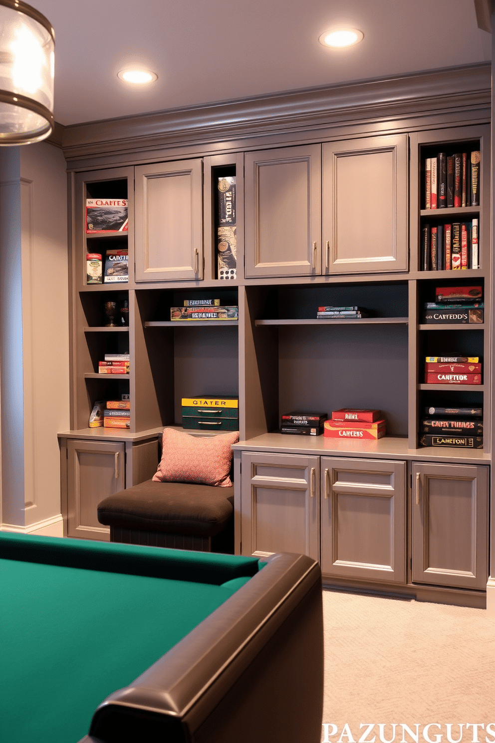 A stylish game room featuring custom-built cabinets designed specifically for board games, providing ample storage and easy access. The walls are painted in a soft gray hue, complemented by plush seating in a darker shade, creating a cozy and inviting atmosphere.