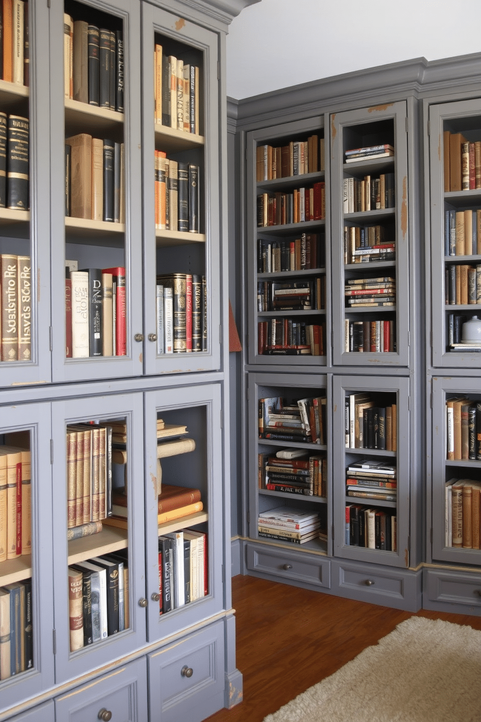 A cozy gray home library featuring vintage bookshelves with distressed finishes. The shelves are filled with an eclectic mix of classic literature and modern novels, creating a warm and inviting atmosphere.