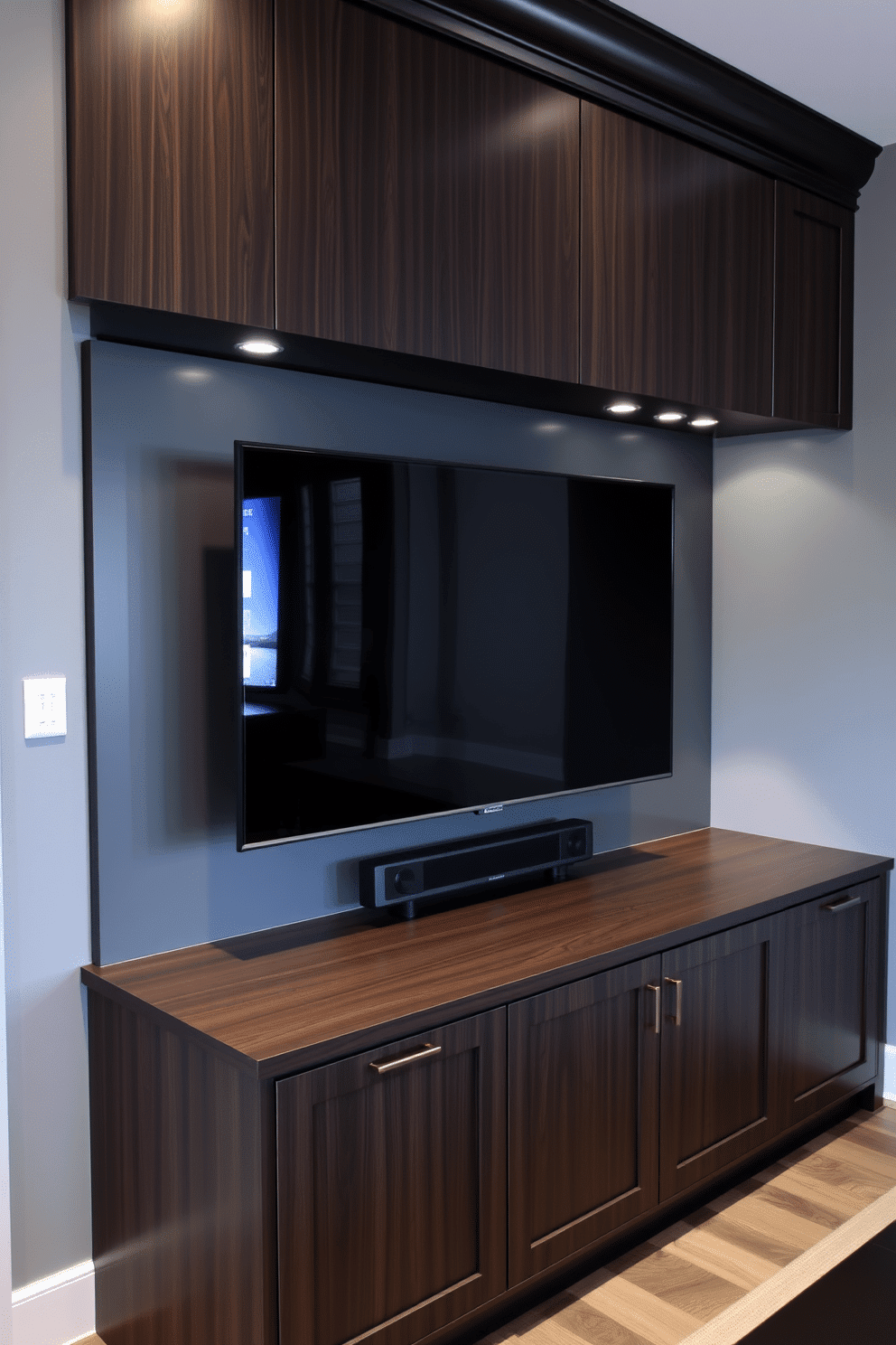 A stylish man cave featuring a gray wall-mounted TV seamlessly integrated into custom cabinetry. The cabinetry is crafted from dark wood, providing a striking contrast against the gray walls, while ambient lighting highlights the entertainment area.