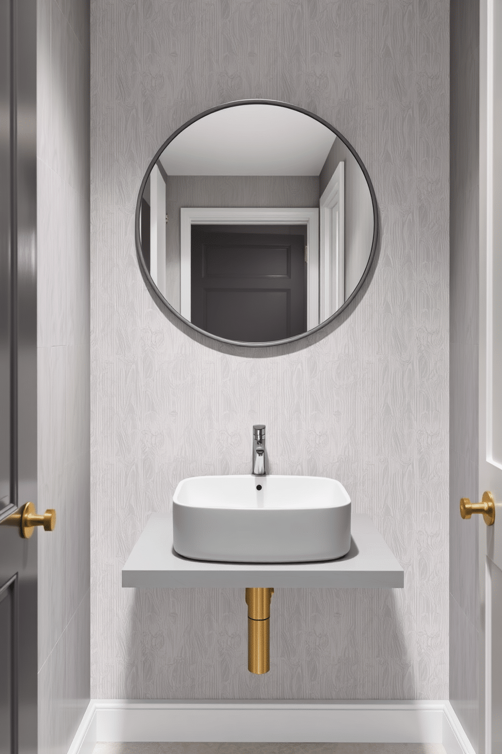 A stylish gray round mirror hangs above a sleek sink in a chic powder room. The walls are adorned with a soft gray wallpaper, complemented by elegant brass fixtures and a minimalist floating vanity.