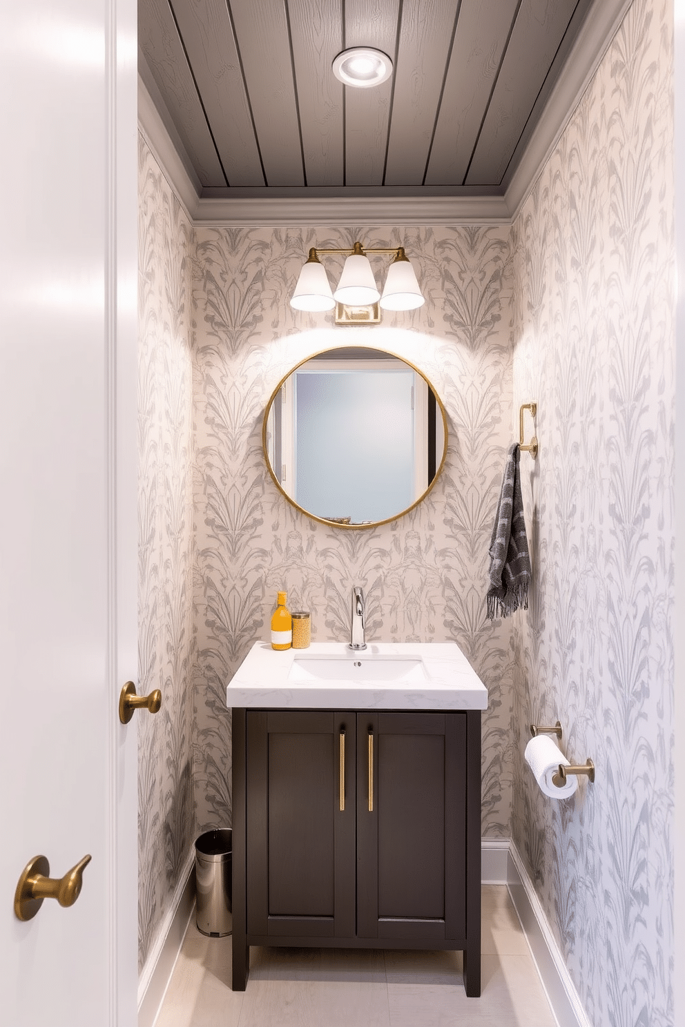 A chic powder room featuring a gray painted wood ceiling that adds a touch of uniqueness and warmth to the space. The walls are adorned with elegant wallpaper in soft tones, complemented by a sleek, modern vanity with a polished chrome faucet and a round mirror above it.