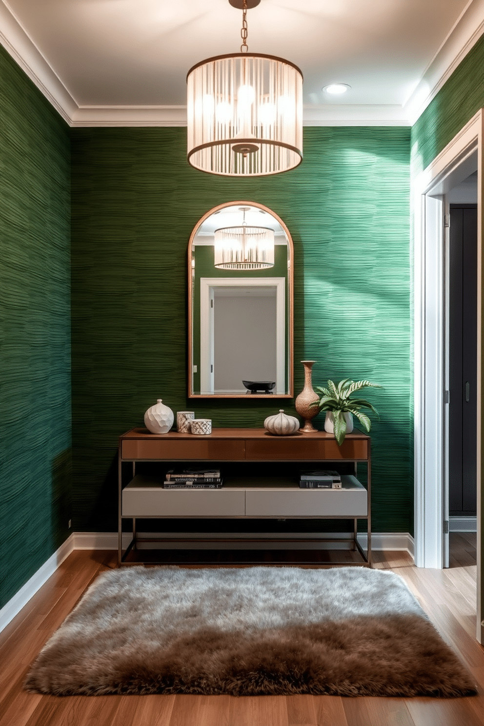 Textured green wall panels create an inviting foyer that exudes elegance and warmth. The space features a sleek console table adorned with decorative objects and a stylish mirror above, reflecting natural light. A plush area rug in neutral tones anchors the room, while strategically placed greenery adds a touch of freshness. Ambient lighting from a modern chandelier enhances the overall aesthetic, making the foyer a welcoming entry point.