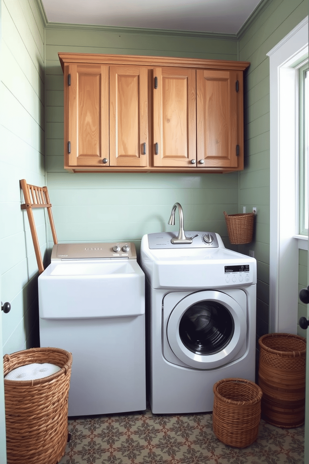 A rustic green laundry room features shiplap walls painted in a soft, muted green, creating a cozy and inviting atmosphere. Vintage-style wooden cabinets above the washer and dryer provide ample storage, while a farmhouse sink with a brushed nickel faucet adds a touch of charm. The floor is adorned with patterned tiles that complement the green tones, enhancing the rustic feel. A wooden drying rack and woven baskets are strategically placed to add functionality and warmth to the space.