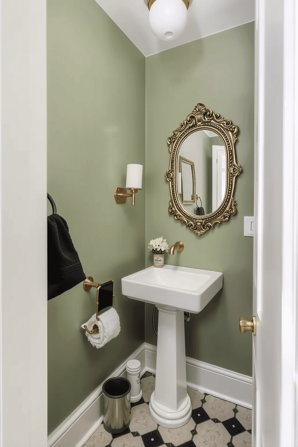 A charming powder room features muted green walls that create a serene atmosphere. Vintage-inspired mirrors with ornate frames hang above a sleek, modern sink, adding a touch of elegance. The floor is adorned with classic black and white tiles that contrast beautifully with the soft green. Accents of gold in the fixtures and accessories enhance the vintage vibe, creating a cohesive and inviting space.