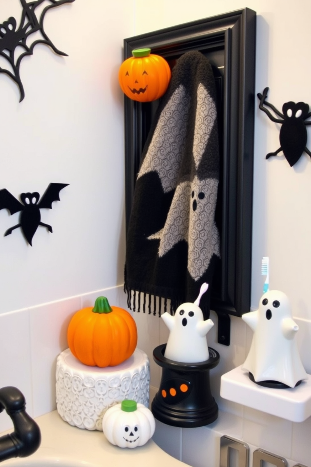 A whimsical Halloween bathroom setting featuring ghost-shaped soap and toothbrush holders. The decor includes playful accents like spooky-themed towels and a black and white color scheme to enhance the festive atmosphere.