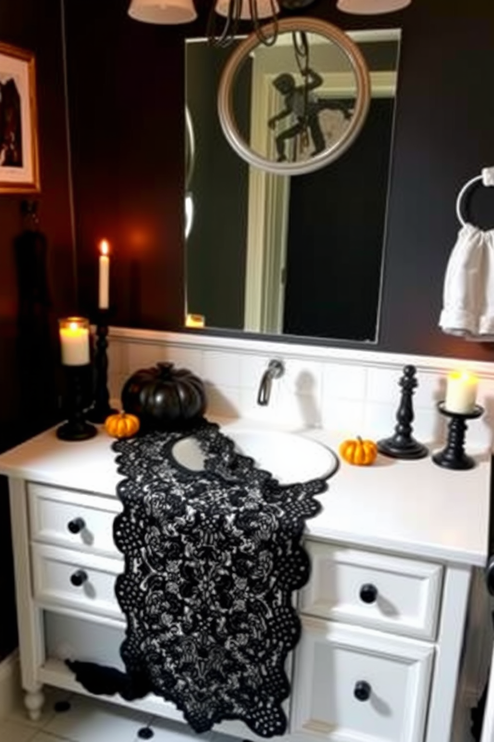 A stylish bathroom decorated for Halloween features a black lace table runner elegantly draped across the vanity. The vanity is adorned with spooky accents like miniature pumpkins and flickering candle holders, creating a festive yet sophisticated atmosphere.