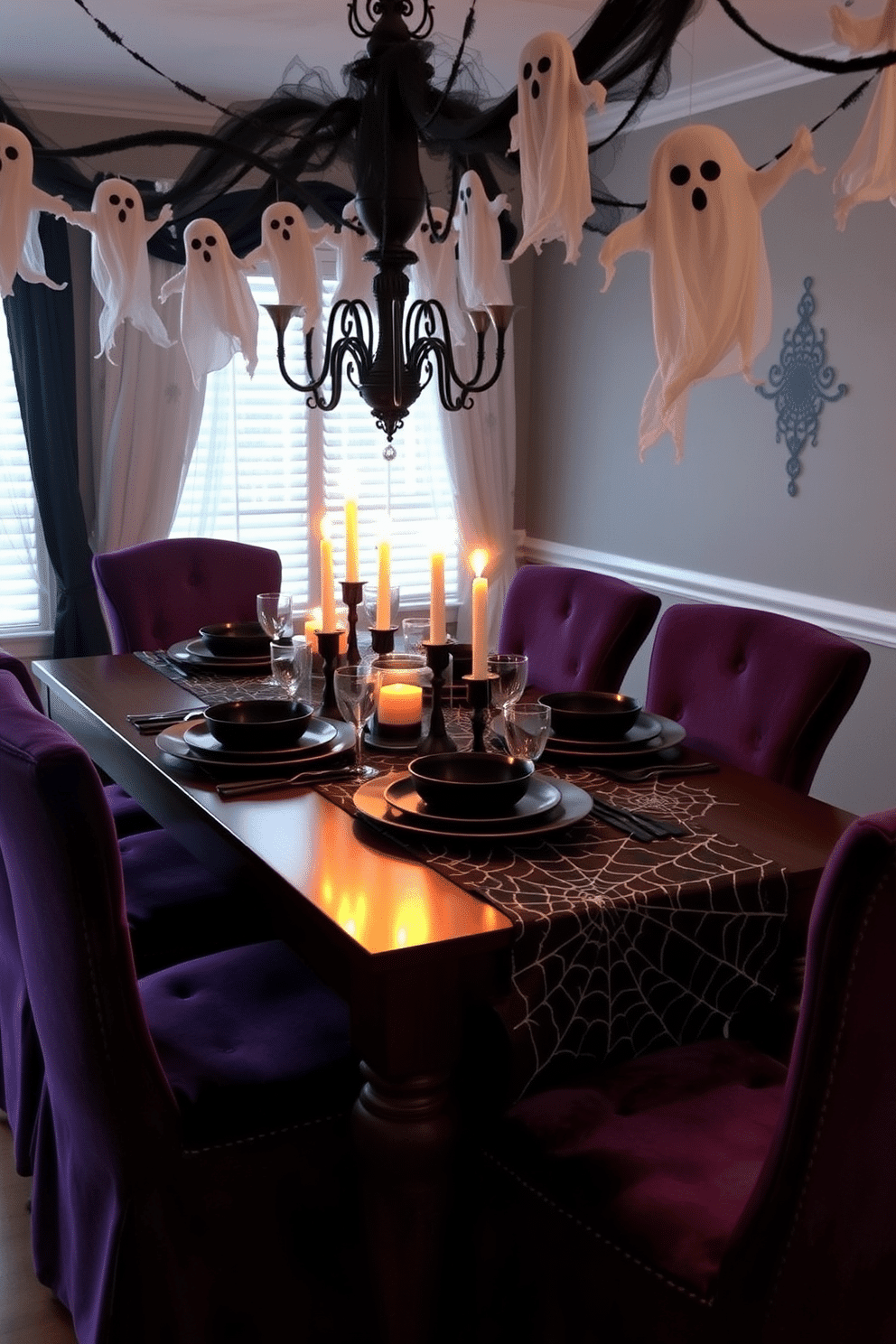 A dining table elegantly adorned with spider web table runners creates a spooky yet stylish atmosphere for Halloween. The table is set with black and orange dinnerware, and flickering candlelight adds to the eerie ambiance. Surrounding the table, ghostly decorations hang from the ceiling, enhancing the festive spirit of the occasion. Plush chairs with deep purple cushions invite guests to sit and enjoy a hauntingly delightful dinner.