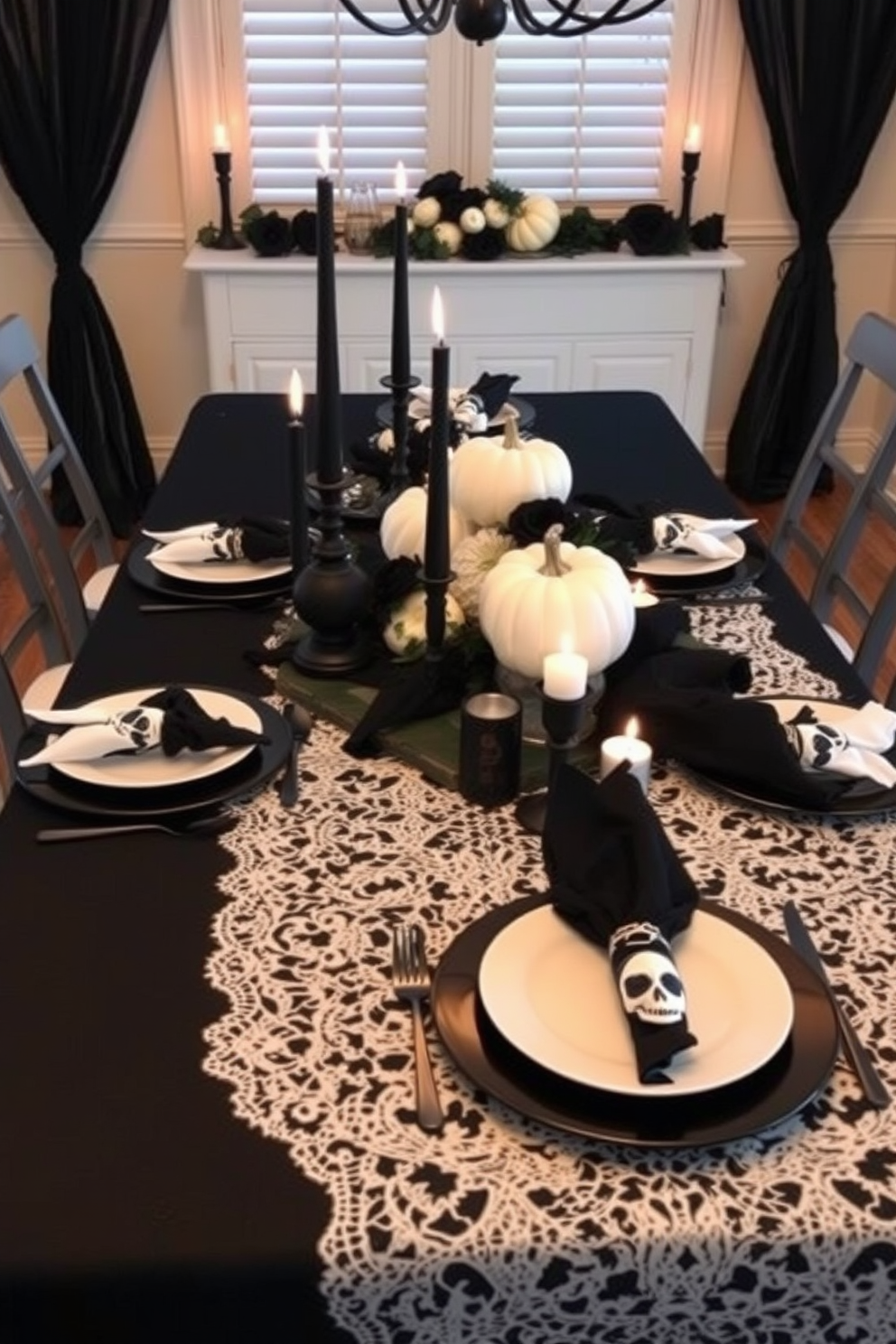 A spooky dining room setting for Halloween features a long black table draped with a white lace tablecloth. Black and white dinnerware is arranged elegantly, with skull-themed plates and ghostly napkins folded beside each place setting. Candles in black holders flicker softly, casting eerie shadows across the table. A centerpiece of white pumpkins and black roses adds a hauntingly beautiful touch to the decor.