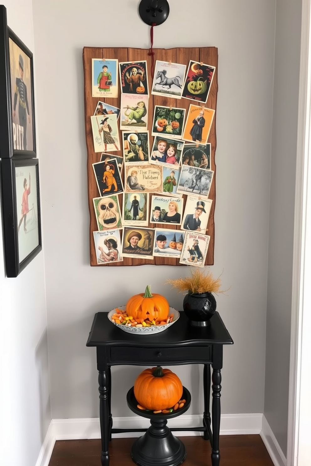 A charming entryway adorned with vintage Halloween postcards creates a nostalgic atmosphere. The postcards, featuring classic Halloween imagery, are artfully arranged on a rustic wooden board, adding a touch of whimsy to the space. A black and orange color scheme enhances the festive feel of the entryway. A small table beneath the postcards displays a carved pumpkin and a decorative bowl filled with candy, inviting guests to celebrate the season.