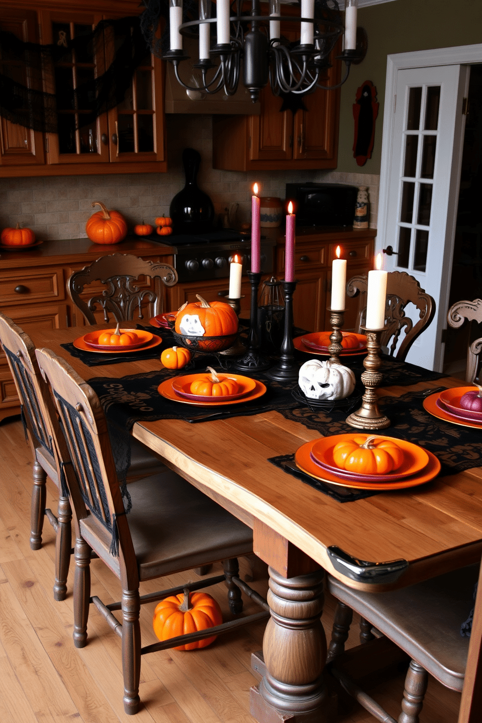 A Halloween-themed kitchen adorned with a black lace tablecloth that drapes elegantly over a rustic wooden dining table. The table is set with orange and purple dishes, complemented by flickering candle holders and small pumpkins scattered throughout for a festive touch.