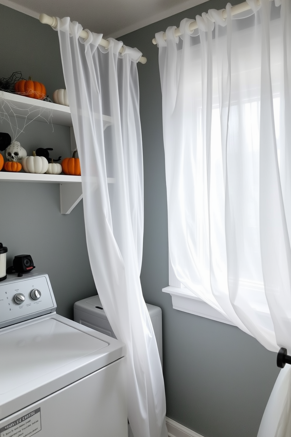 A ghostly laundry room features sheer white curtains that billow softly in the breeze, creating an ethereal atmosphere. Spooky decorations like miniature pumpkins and cobwebs adorn the shelves, adding a festive touch for Halloween.