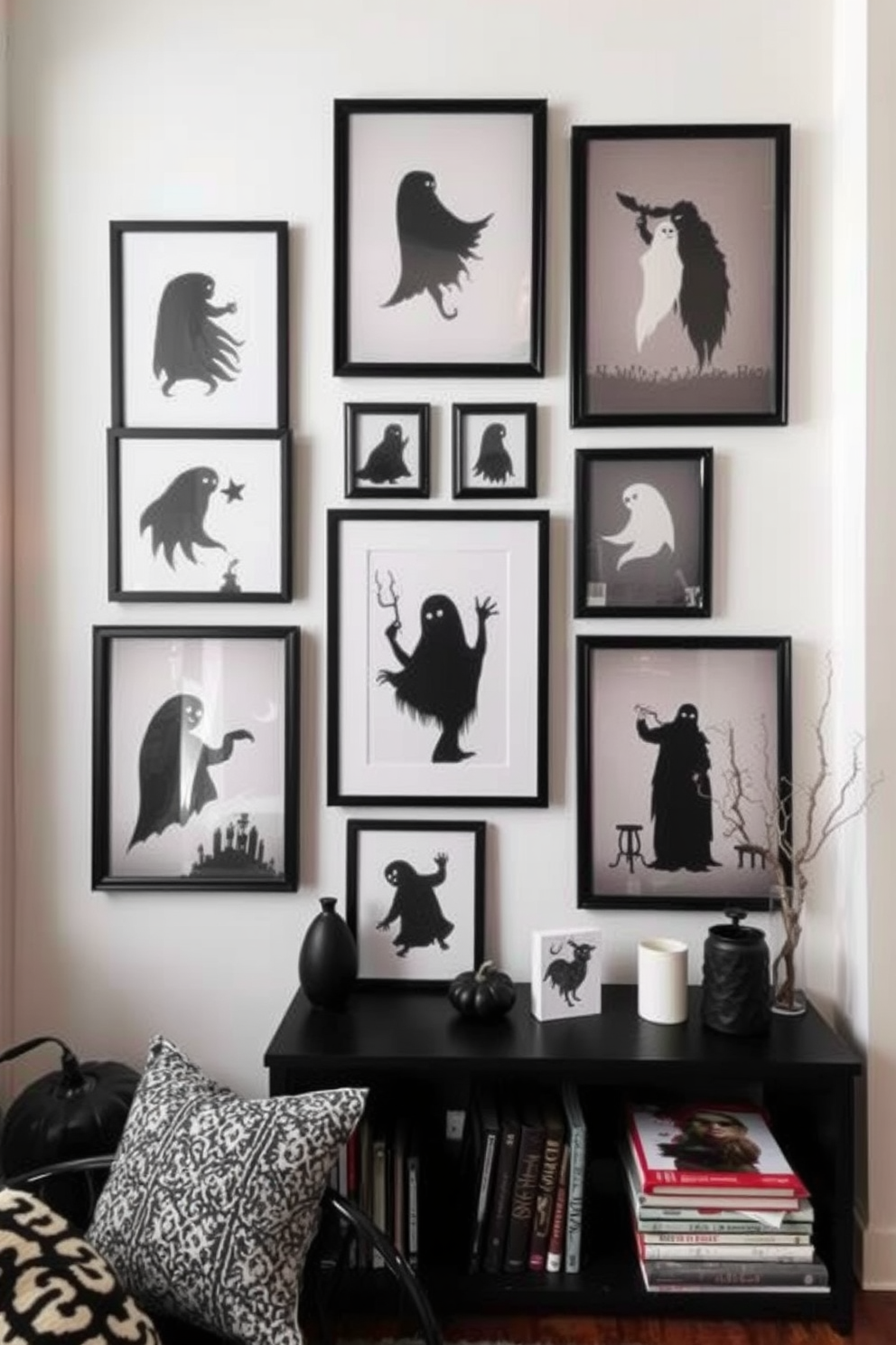 A collection of spooky wall art featuring ghostly silhouettes creates an eerie yet stylish atmosphere in the loft. The artwork is arranged in a gallery style, with black frames contrasting against the light-colored walls, enhancing the Halloween theme.