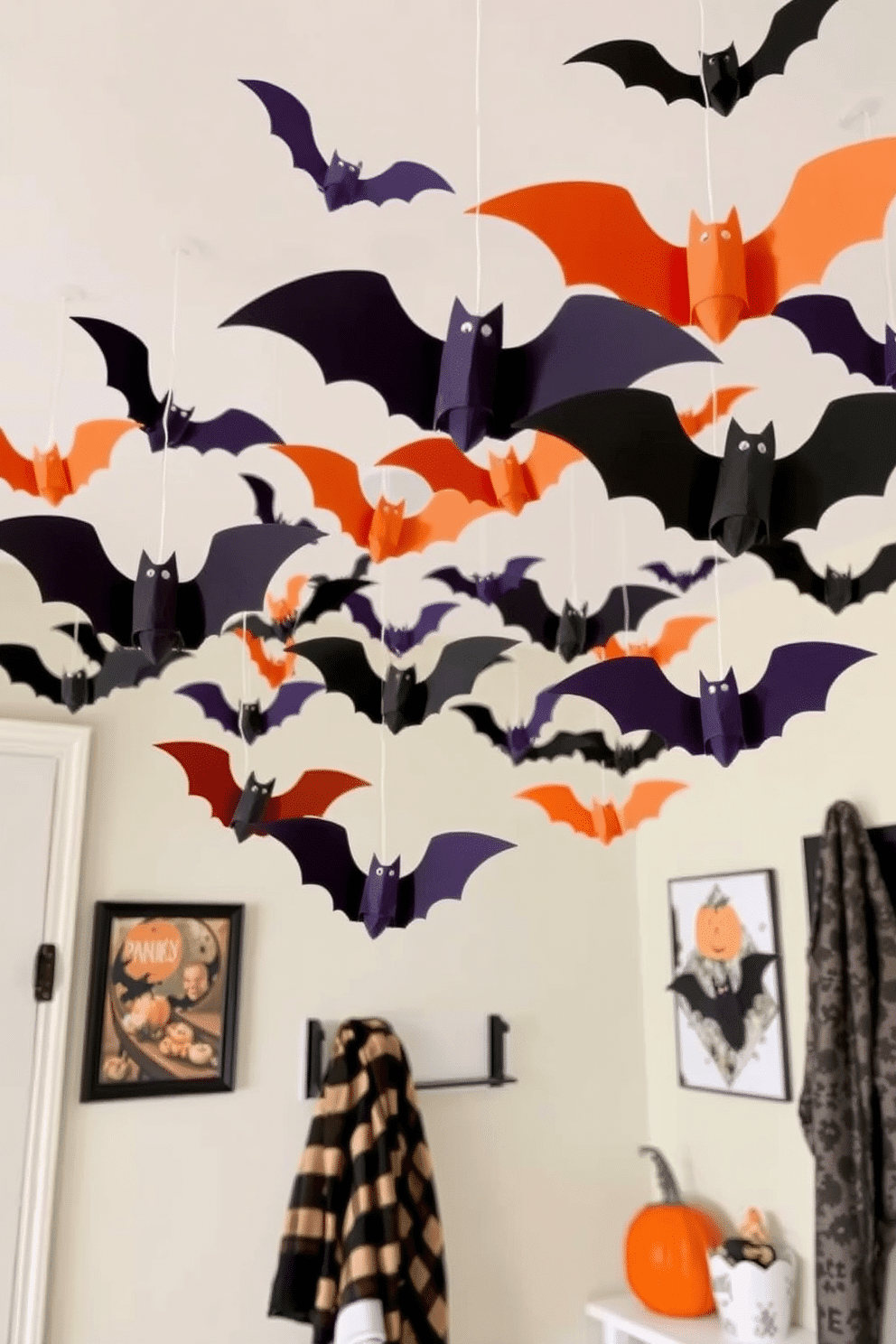 Hanging paper bats from the ceiling create a whimsical and spooky atmosphere in your Halloween-themed space. The bats are crafted in various sizes and colors, adding depth and interest to the room. For Halloween mudroom decorating ideas, consider using a mix of festive colors such as orange, black, and purple. Incorporate seasonal elements like a pumpkin display, cozy blankets, and themed wall art to enhance the festive spirit.