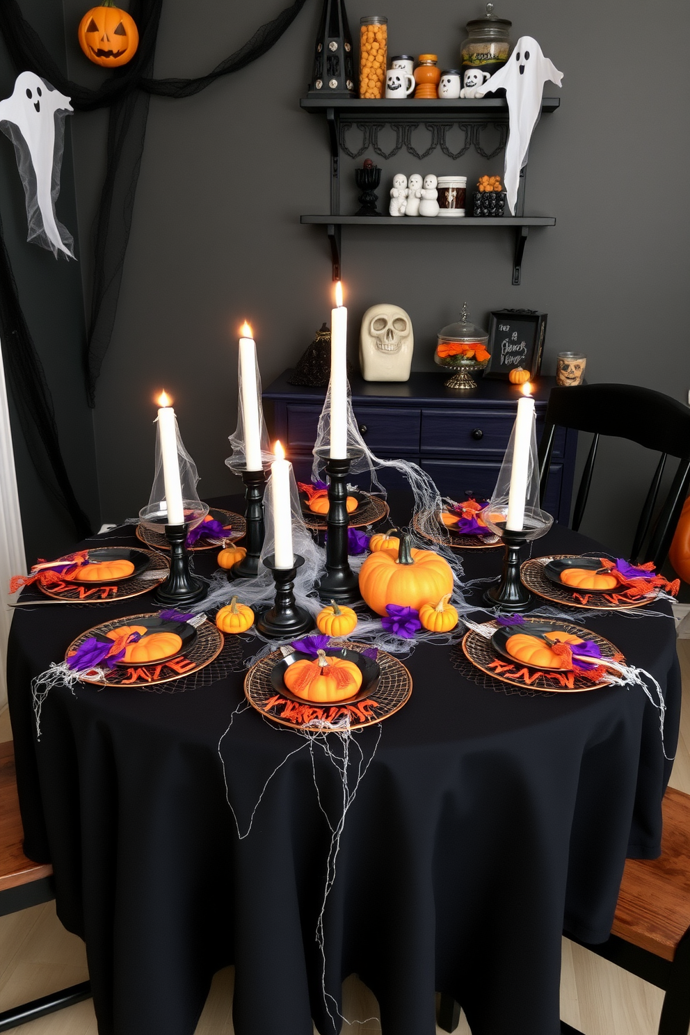 A spooky table setting for Halloween features a black tablecloth adorned with orange and purple accents. Candles in various heights flicker on the table, surrounded by miniature pumpkins and faux cobwebs for an eerie touch. Incorporate small space decorating ideas by using a compact round table that maximizes surface area. Hang ghostly decorations from the ceiling and use wall-mounted shelves to display festive treats and spooky decor.