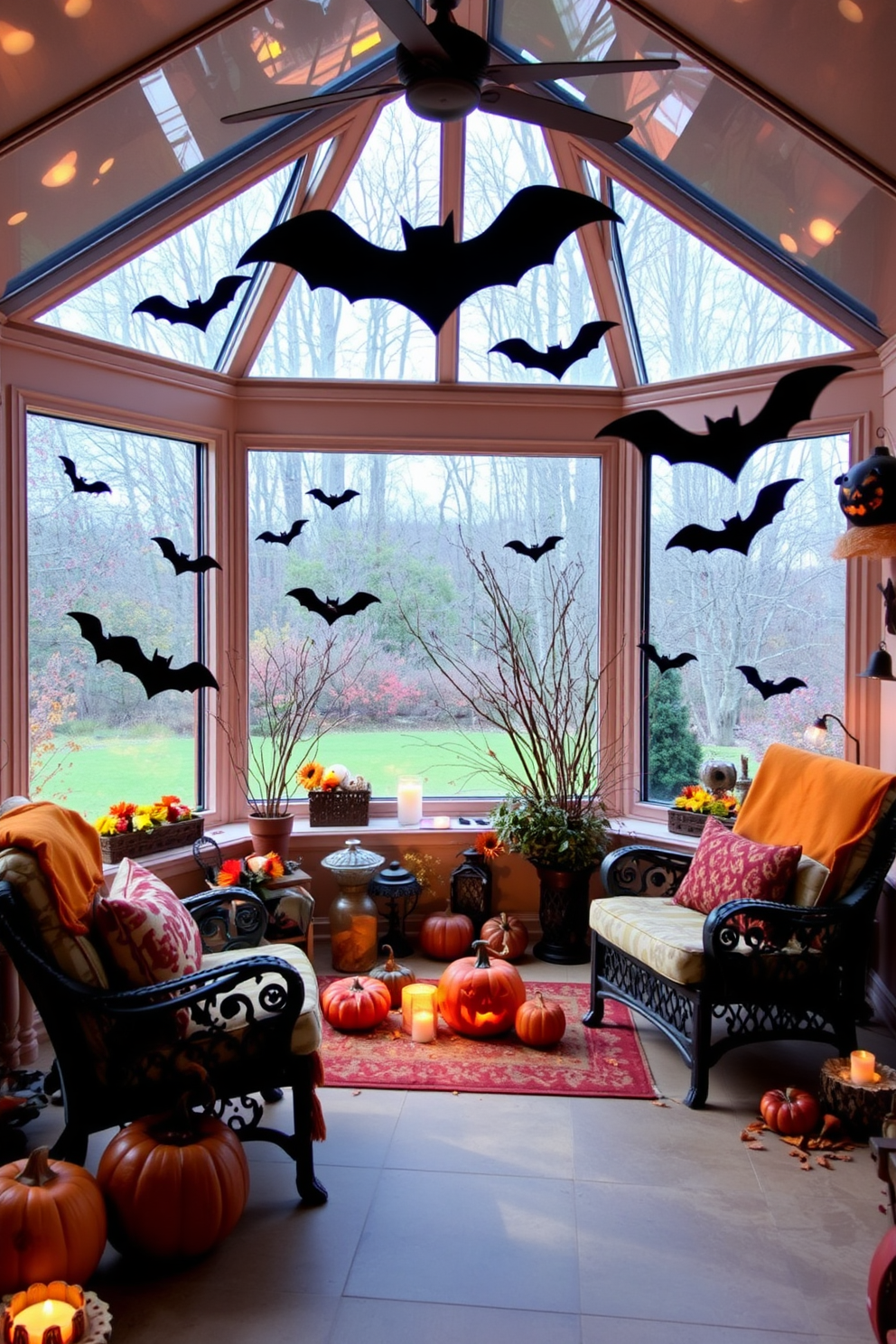 A cozy sunroom decorated for Halloween features large glass windows adorned with bat silhouettes. The space is filled with warm, inviting colors and seasonal decor, creating a festive atmosphere for relaxation and enjoyment.