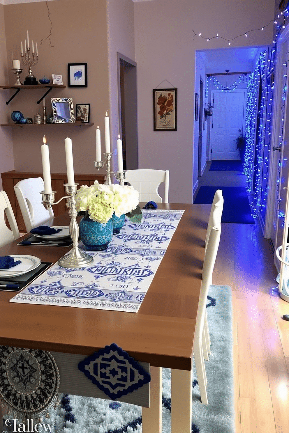 A festive Hanukkah-themed table runner stretches across a beautifully set dining table adorned with blue and silver accents. The runner features intricate patterns of menorahs and dreidels, complemented by elegant candlesticks and a centerpiece of fresh white flowers. The hallway is decorated with strands of blue and white lights, creating a warm and inviting atmosphere. Wall-mounted shelves display decorative items like menorahs and themed artwork, while a soft rug in shades of blue adds a cozy touch underfoot.