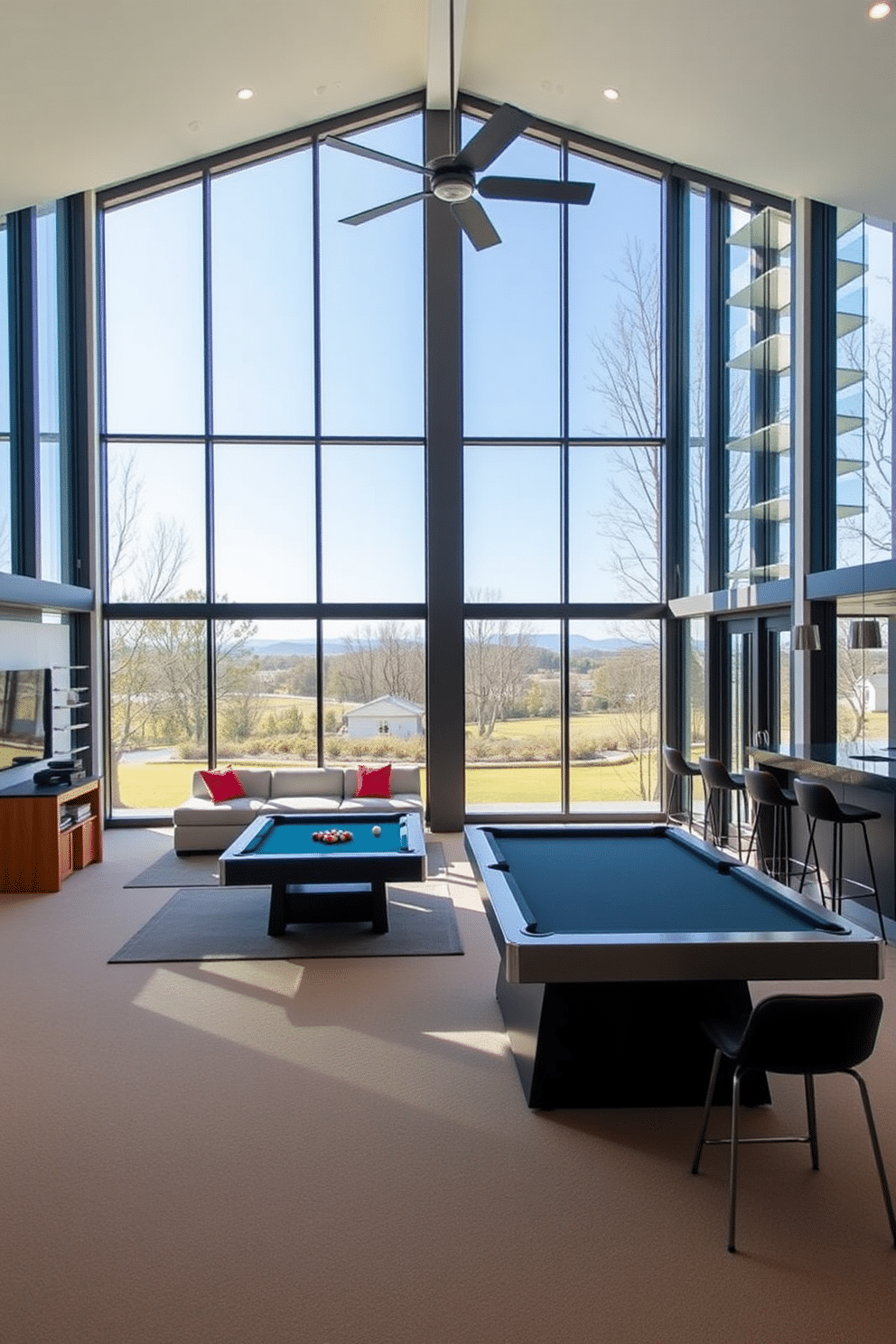 A spacious home game room featuring floor-to-ceiling windows that flood the space with natural light. The room is equipped with a sleek pool table, a comfortable sectional sofa, and a modern bar area with stylish stools.