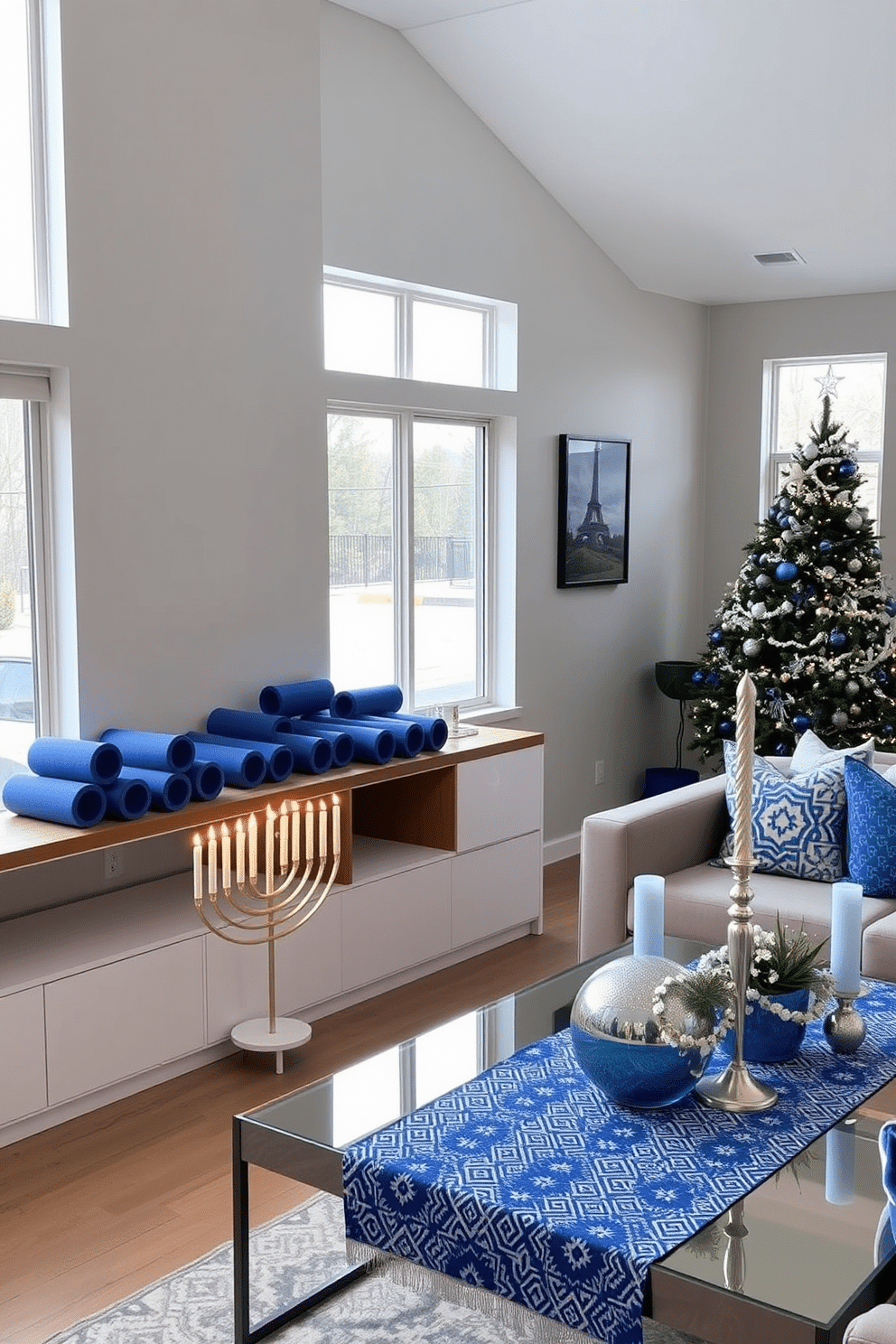 A home gym featuring blue and white foam rollers neatly arranged on a sleek wooden shelf. The walls are painted in a calming light gray, and large windows allow natural light to flood the space, creating an inviting atmosphere. Festive Hanukkah decorations adorn the living room, with a beautifully lit menorah placed on a modern coffee table. Blue and silver accents, including decorative pillows and a vibrant table runner, enhance the warm ambiance of the space.