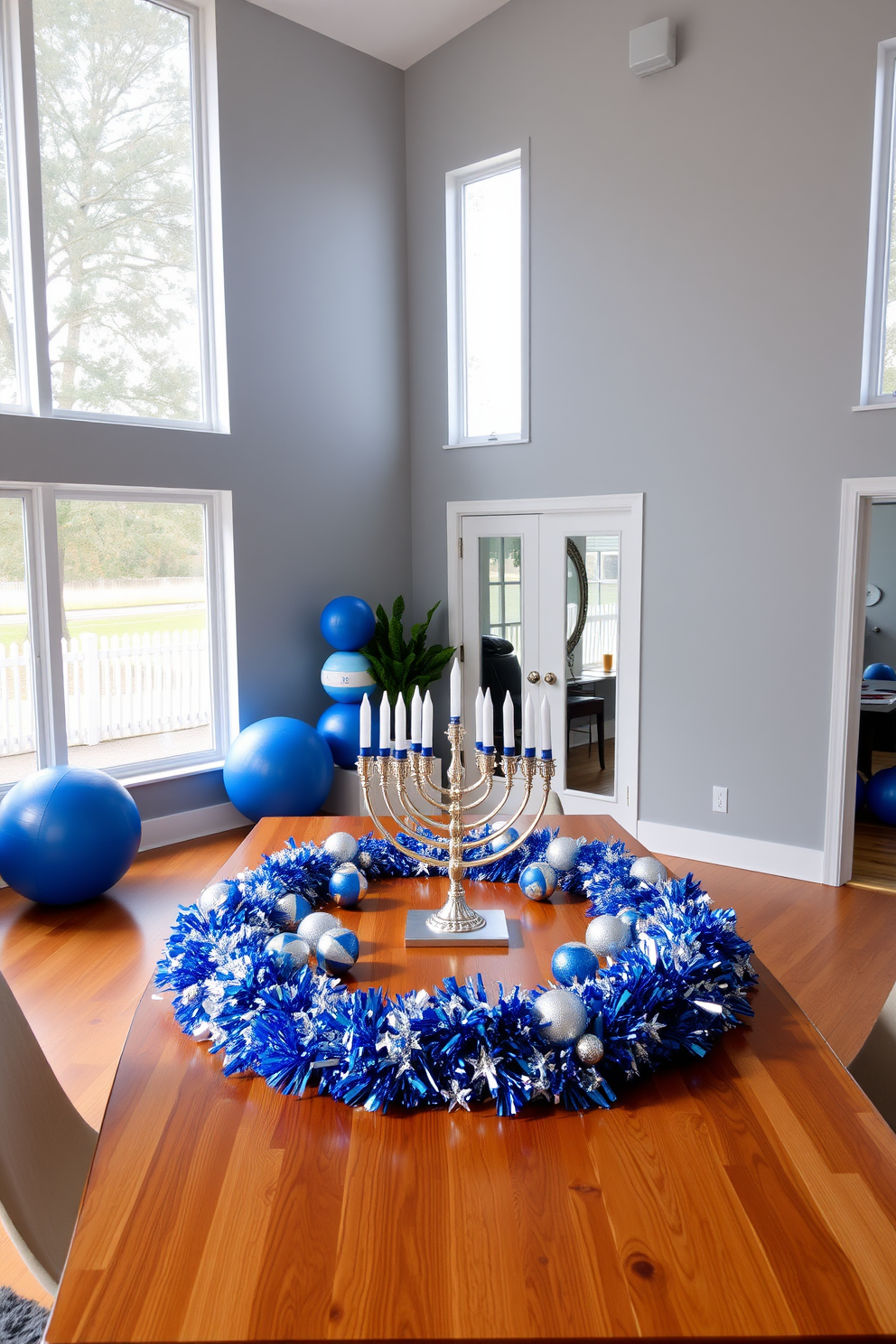 A modern home gym featuring blue and white exercise balls strategically placed in the corner. The walls are painted in a soft gray, and large windows allow natural light to flood the space, highlighting the sleek wooden flooring. A festive Hanukkah decor setup with a beautifully arranged menorah at the center of a dining table. Surrounding the menorah are blue and silver decorations, including dreidels and sparkling garlands, creating a warm and inviting atmosphere for celebration.