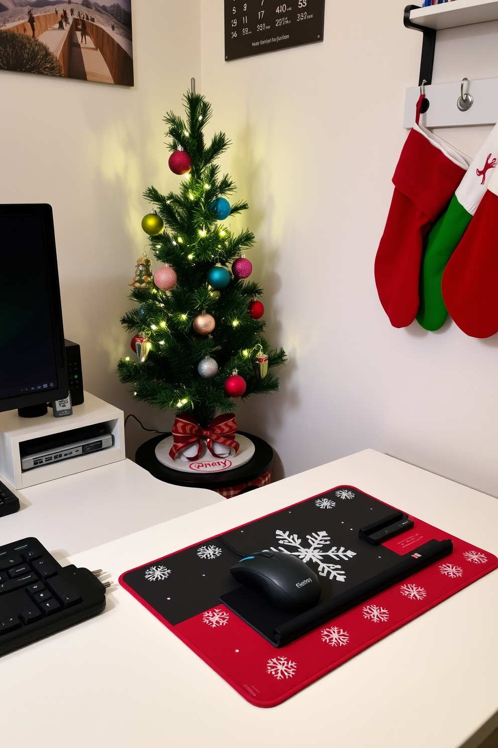 A cozy home office setup adorned for the holiday season. The desk features a festive mouse pad with a snowflake design and a matching keyboard cover, creating a cheerful workspace. A small Christmas tree sits in the corner, decorated with twinkling lights and colorful ornaments. Stockings are hung on a nearby shelf, adding a touch of warmth and holiday spirit to the space.