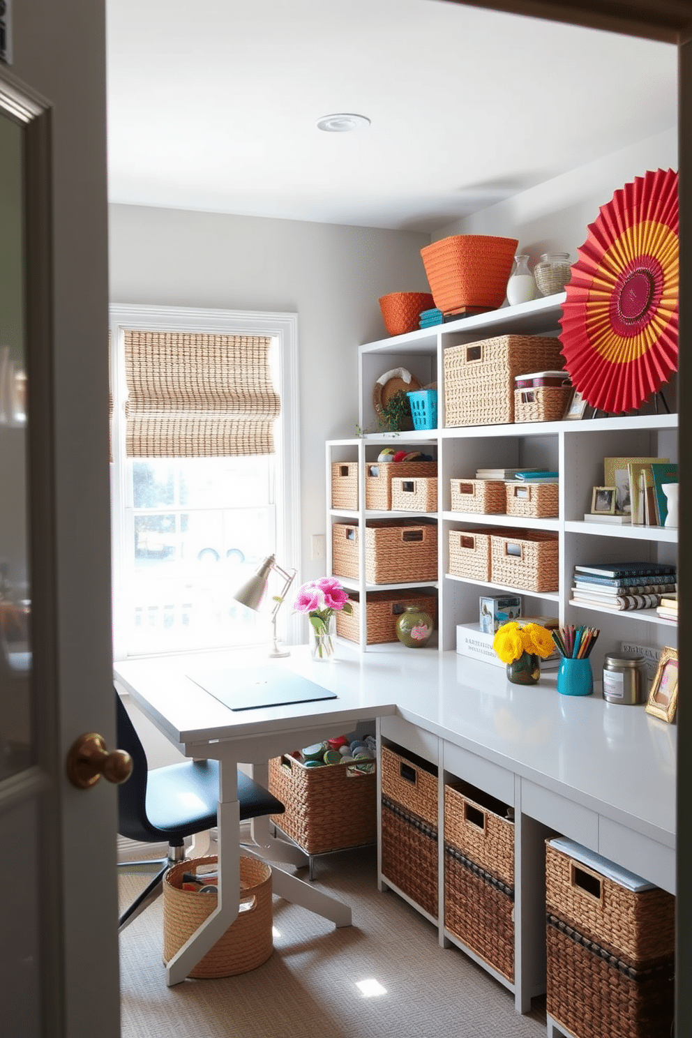 Stylish storage bins in a home office craft room create an organized and visually appealing space. The bins, made of woven materials, are arranged neatly on open shelves, adding texture and warmth to the room. The craft room features a large work table surrounded by bright, natural light from a nearby window. A splash of color is introduced through vibrant wall art and decorative accents, enhancing the creative atmosphere.