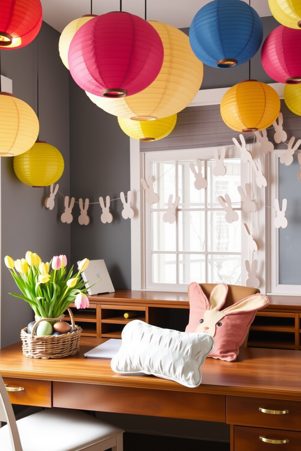 A cozy home office with a large wooden desk placed against a wall adorned with colorful paper lanterns. The lanterns, in shades of red, yellow, and blue, hang from the ceiling, casting a cheerful glow over the workspace. For Easter decorating ideas, the desk is decorated with pastel-colored eggs in a wicker basket and a vase filled with fresh tulips. A soft, bunny-shaped pillow rests on the office chair, and a garland of paper bunnies is draped across the window.