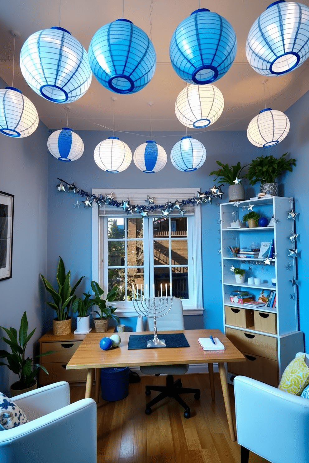 A cozy home office adorned with DIY paper lanterns hanging from the ceiling, casting a warm and inviting glow. The walls are painted a soft blue, and a sleek wooden desk sits in front of a large window, surrounded by potted plants and colorful stationery. For Hanukkah, the office is decorated with elegant blue and silver accents, including a menorah placed prominently on the desk. Festive garlands made of stars and dreidels drape along the shelves, adding a cheerful touch to the workspace.