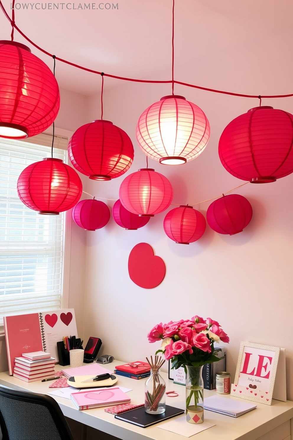 A cozy home office adorned with red and pink paper lanterns hanging from the ceiling, casting a warm and inviting glow. The desk is stylishly cluttered with heart-themed stationery, and a bouquet of fresh flowers in a vase adds a pop of color to the workspace.