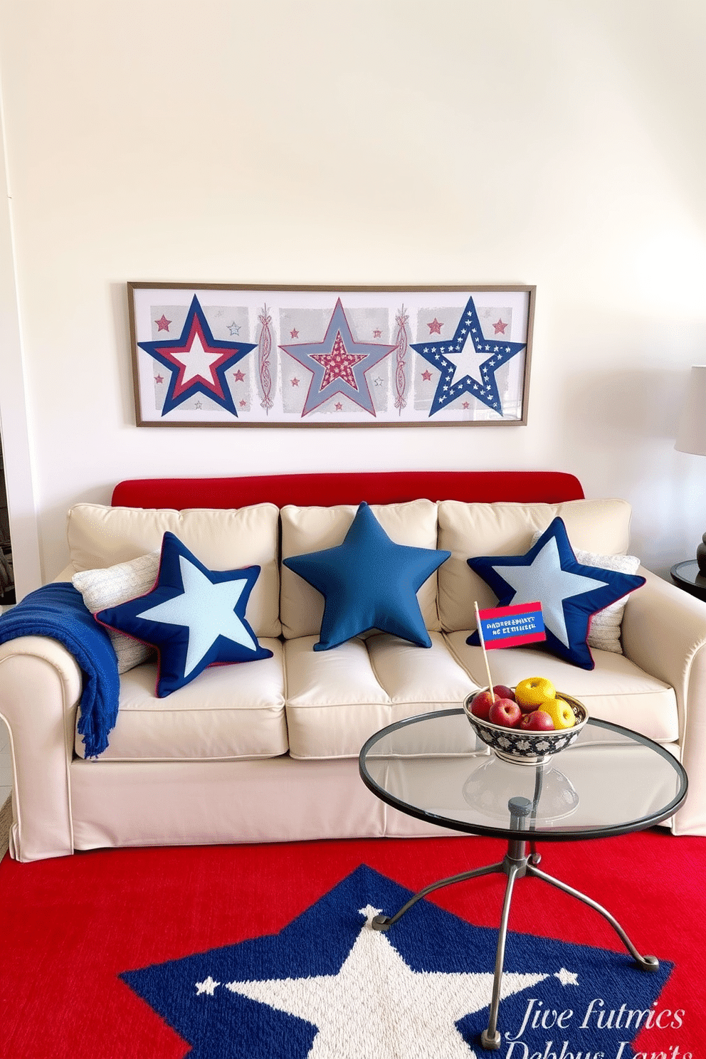 A cozy living room featuring a plush sofa adorned with star shaped decorative pillows in red white and blue. The walls are painted in a soft white hue and patriotic artwork hangs above the sofa creating a festive atmosphere. In the corner of the room a small table is set with a decorative bowl filled with fresh fruit and a small flag. A vibrant area rug with a star pattern ties the space together making it perfect for celebrating Independence Day.