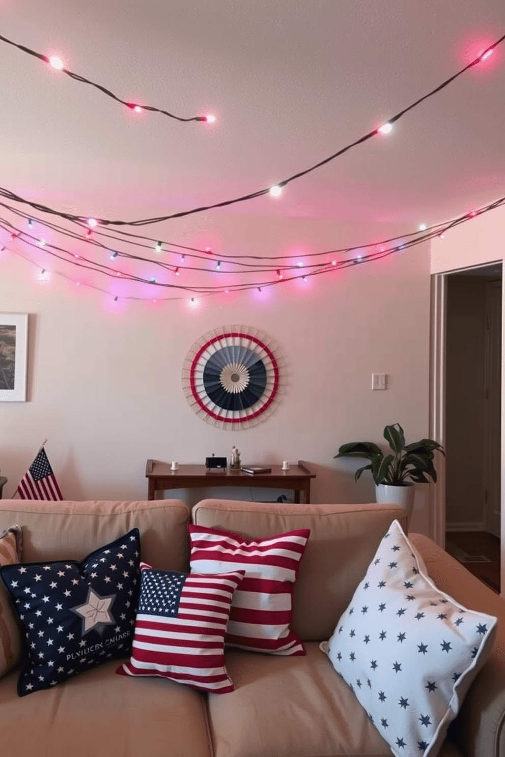 A cozy apartment decorated for Independence Day features festive string lights in red, white, and blue draped across the ceiling. The living area is adorned with patriotic-themed cushions on a comfortable sofa, creating a warm and inviting atmosphere.