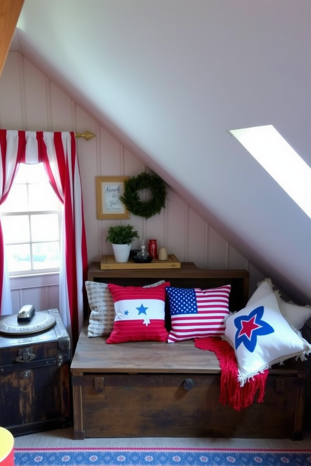 A cozy attic space decorated for Independence Day features red white and blue striped curtains that frame the windows. The room is filled with vintage decor like an old trunk and patriotic-themed throw pillows on a rustic wooden bench.