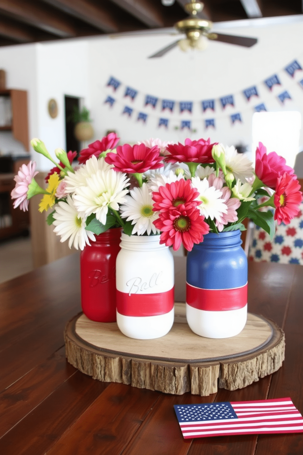 A festive basement setting decorated for Independence Day. The centerpiece features DIY painted mason jars in red white and blue filled with fresh flowers and placed on a rustic wooden table.