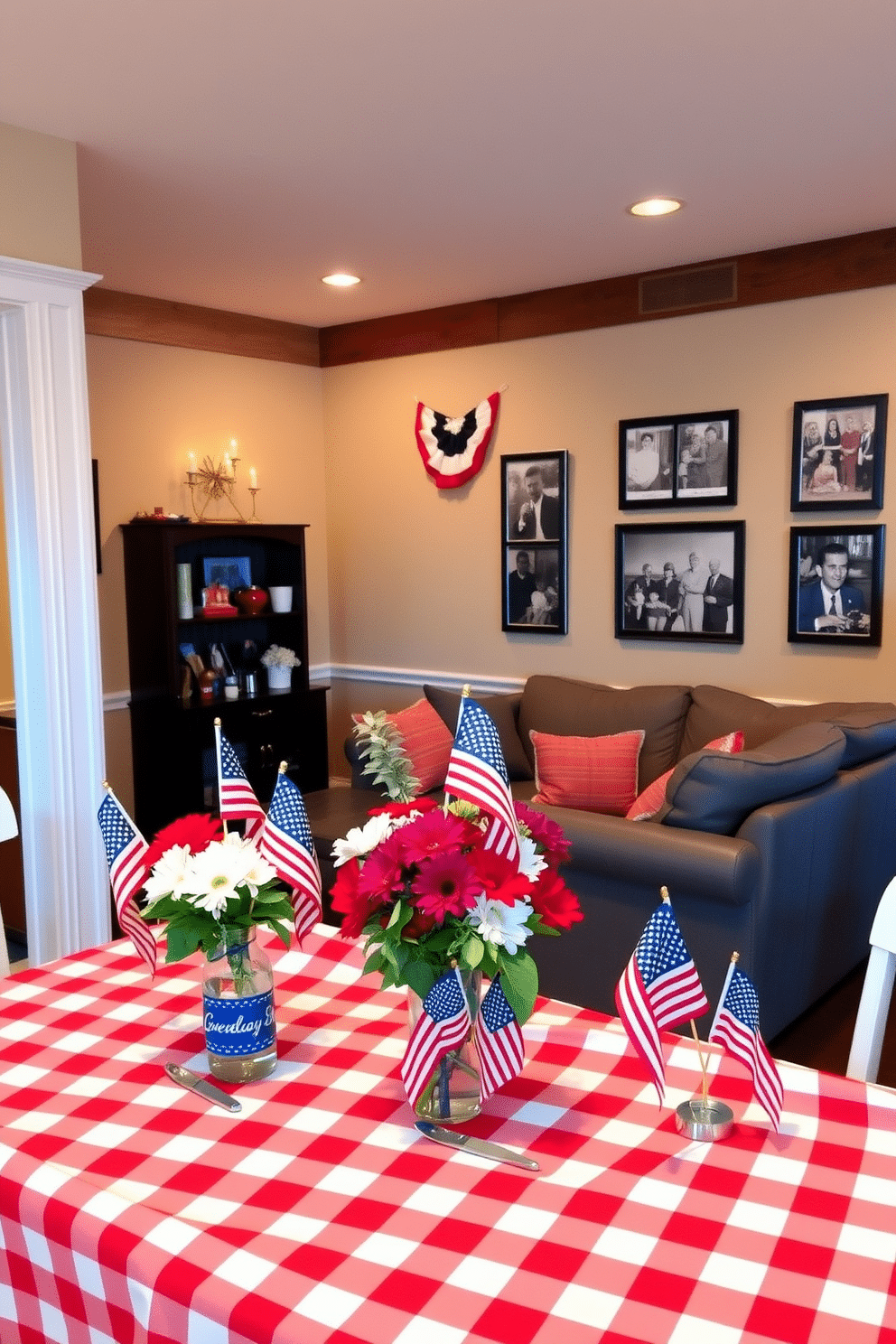 A festive table setting features vibrant flag motifs celebrating Independence Day. The table is adorned with a red and white checkered tablecloth, and centerpieces of miniature flags and fresh flowers in patriotic colors. The basement is decorated with a cozy lounge area, showcasing comfortable seating and warm lighting. Wall art includes framed photographs of past Independence Day celebrations, creating a nostalgic atmosphere.