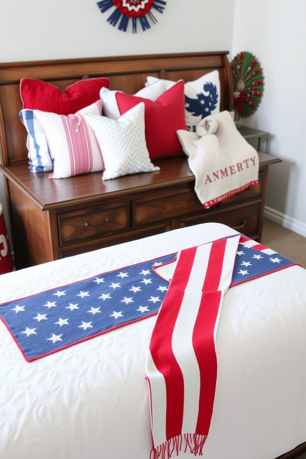 A festive bedroom setting featuring an American flag themed table runner draped across a wooden dresser. The room is adorned with red white and blue accents including throw pillows and a cozy blanket on the bed.